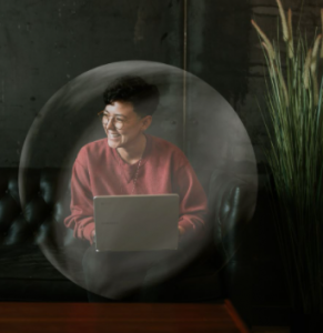 woman wfh on laptop in bubble
